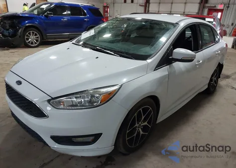 2015 Ford Focus Se z USA, uszkodzony, nr VIN 1FADP3F24FL230113